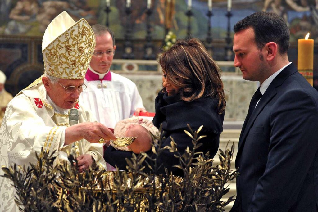 Catholic baptism - Pope Benedict baptizes a baby at the Sistine Chapel