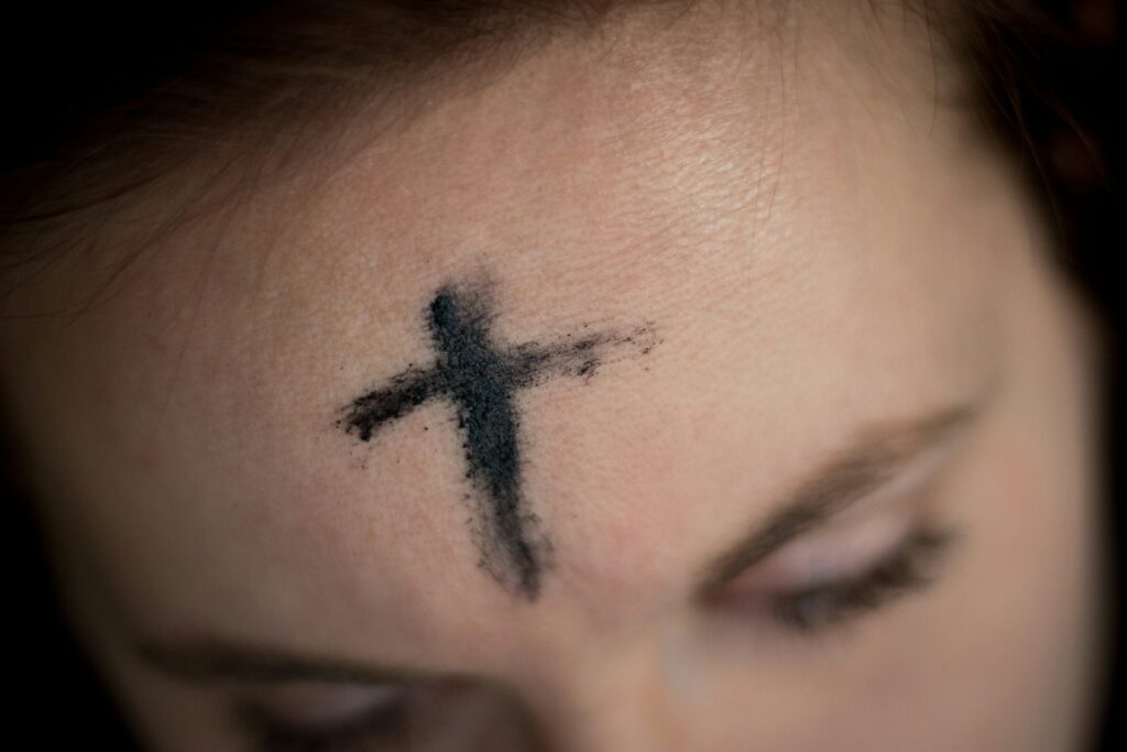 Lent Catholic Church - Woman with ashes on forehead
