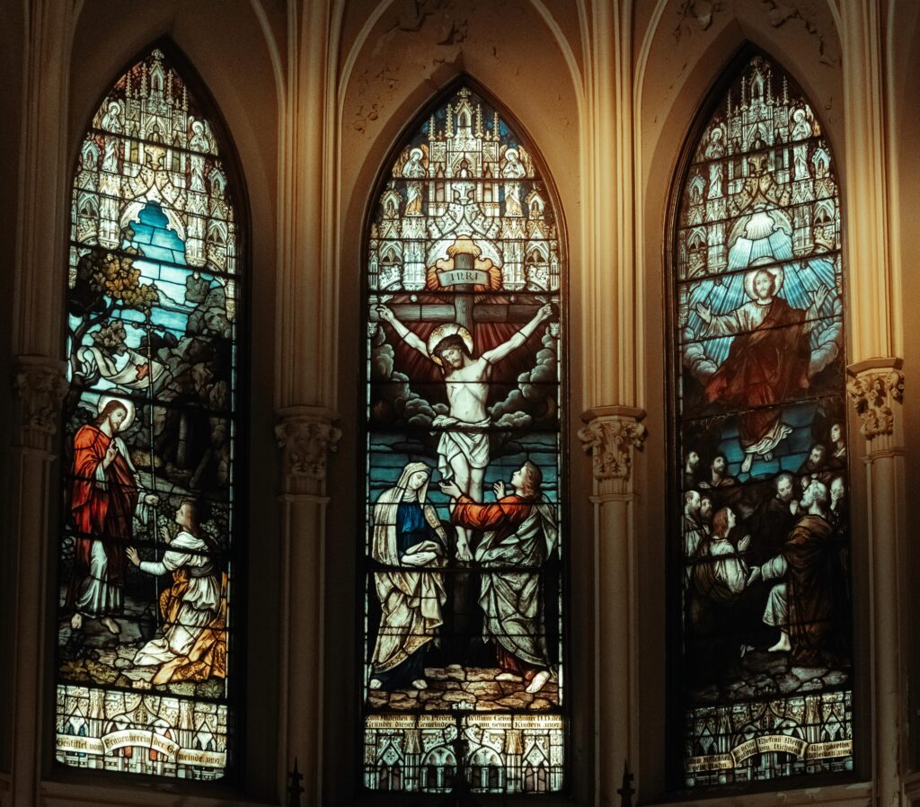 Stained glass depicting a religious scene in a catholic church